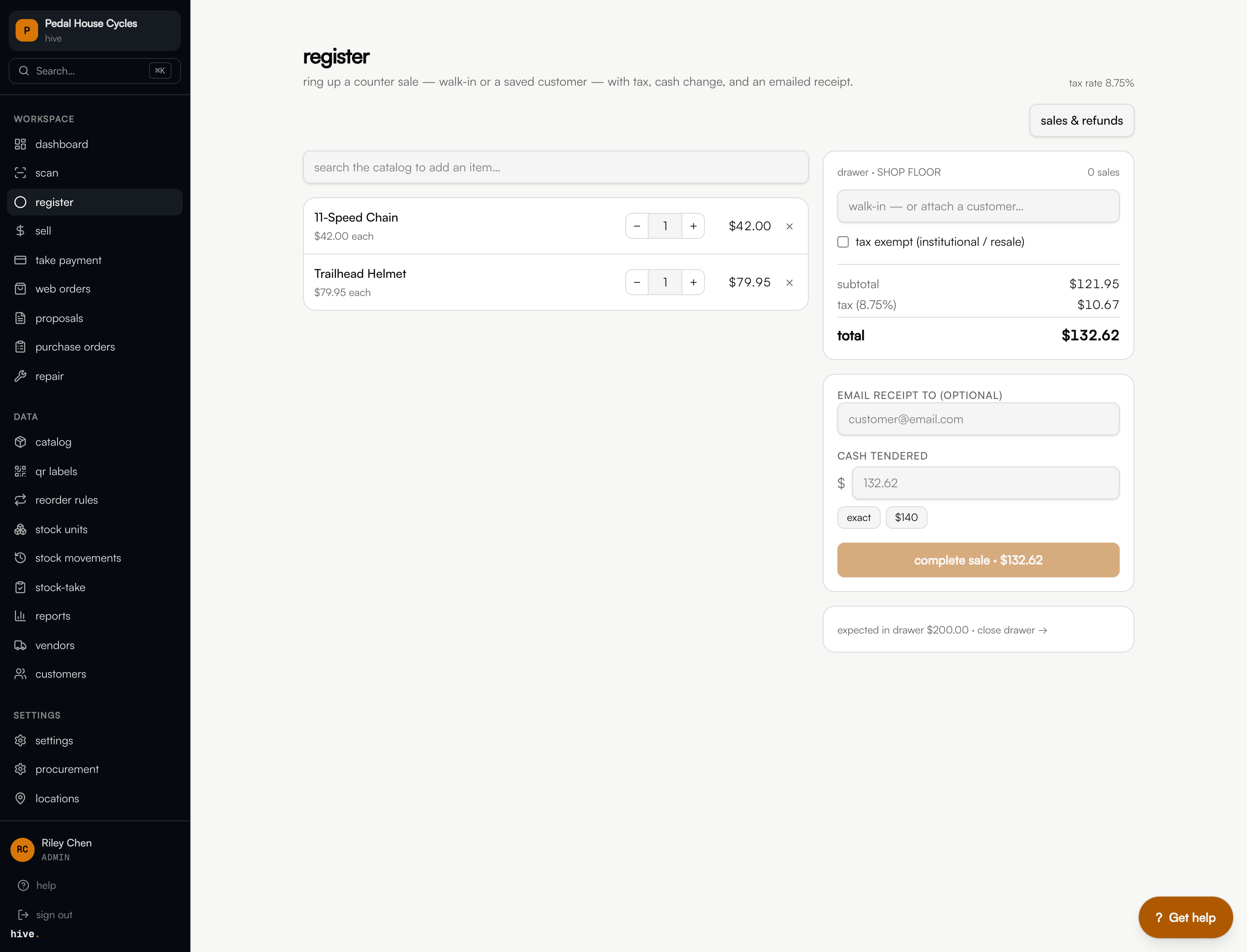 The retail register ringing up a sale with running subtotal, tax, and total